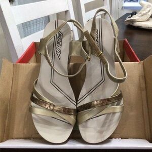 DKNY  goldtone and silvertone wedge sandals. Size 9 new in box.